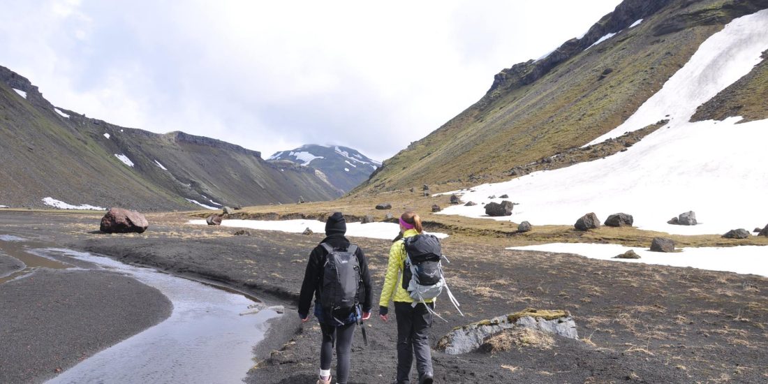 Two geology students hiking in Iceland