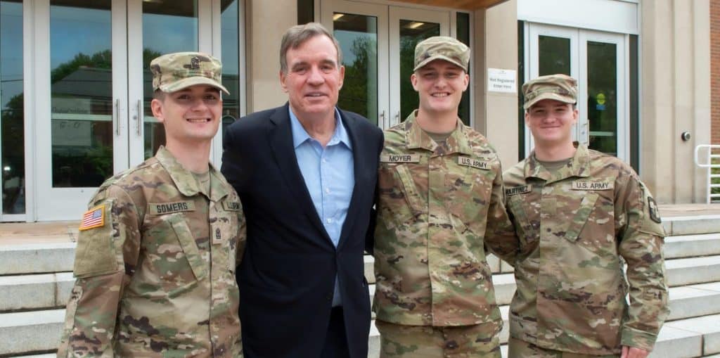 Group of ROTC cadets stading with governor Youngkin