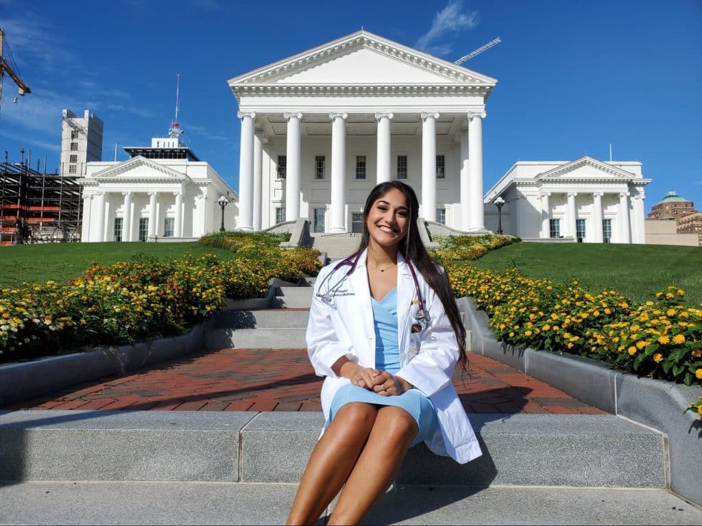 Medical student sitting on steps