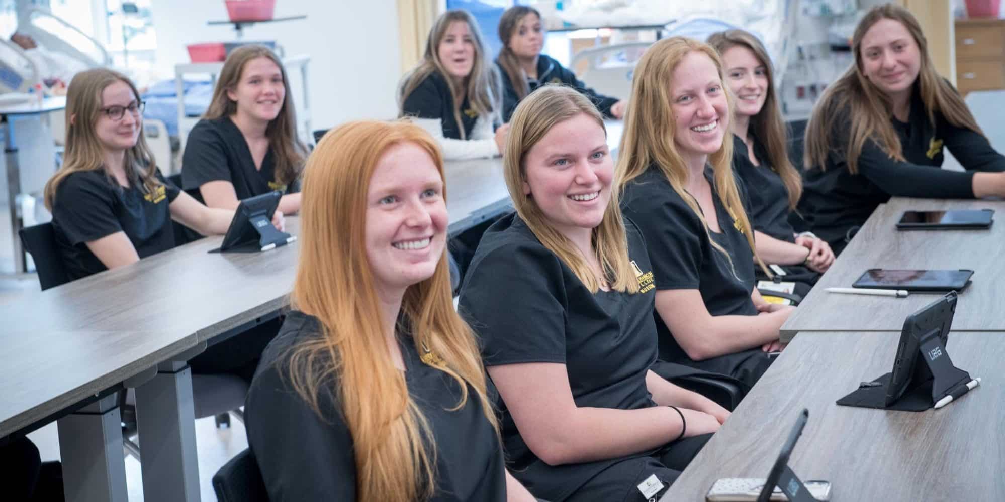 RMC nursing students smile during class