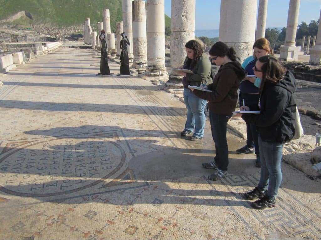 Students studying religious writings in Israel