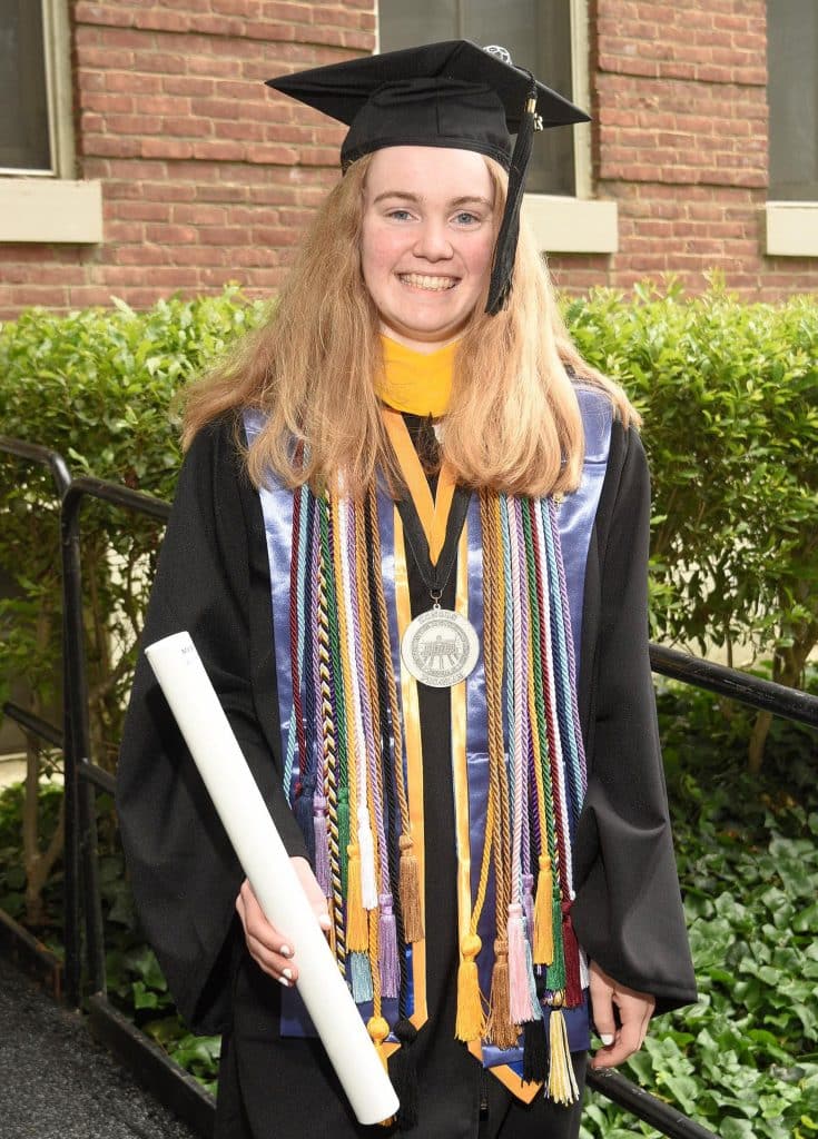 Megan Gunn '23 with her diploma at Commencement