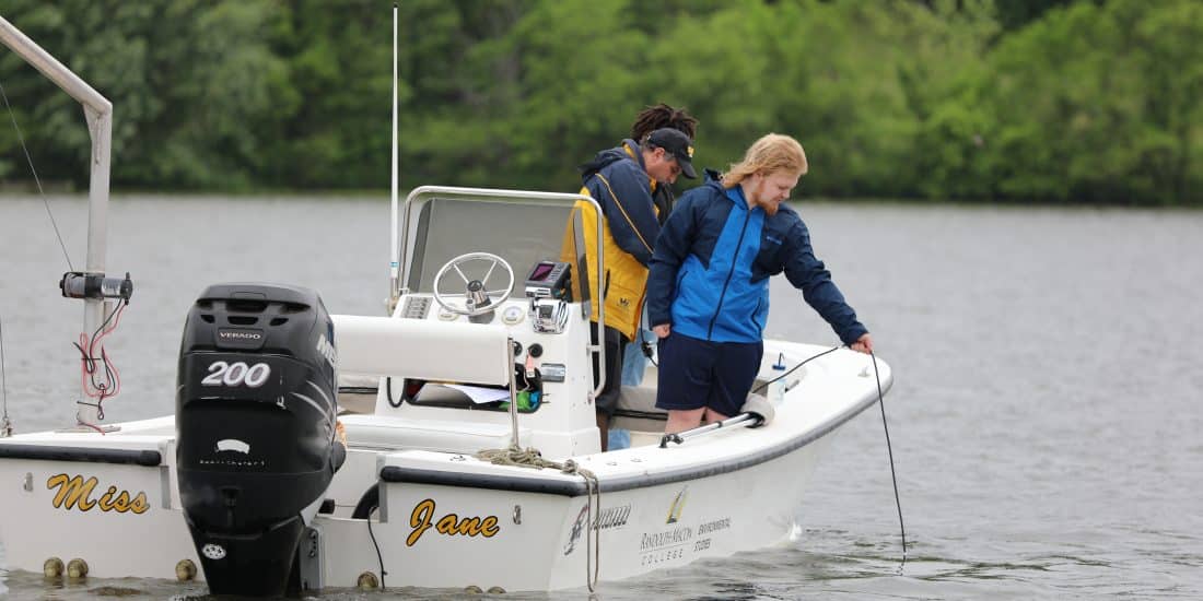 Professor Mike Fenster, Wyatt Cotner '23, and Trey Canady '23 gather data on Lake Anna as a part of the Environmental Problem Solving Course