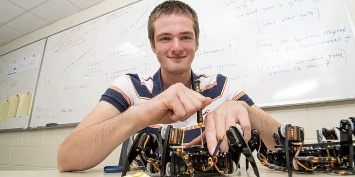 Max Spivey working on a Spider Robot