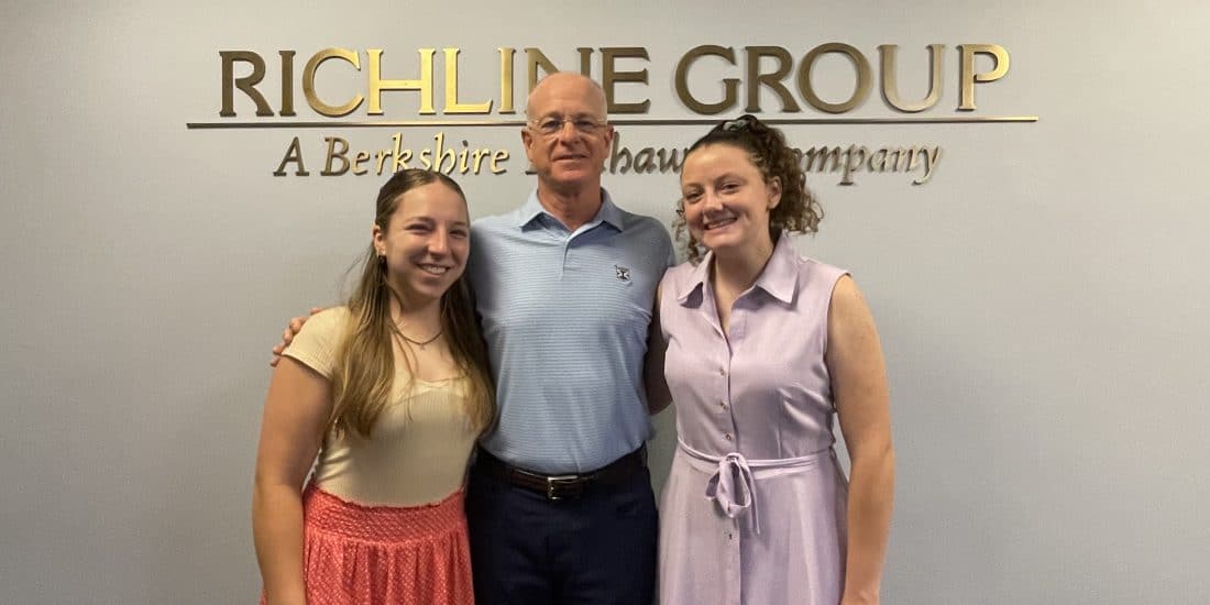 Sarah Wilsey ‘24 and Jenna Shaughnessy ‘24 pose with Dave Meleski ‘81 at the Richline Group offices