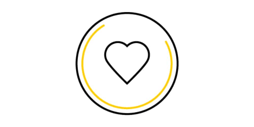 A heart in a circle with a yellow outline.