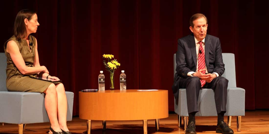 Chris Wallace speaks on stage during the Reynolds Speakers Series next to Joan Conners, an RMC professor who moderated the discussion